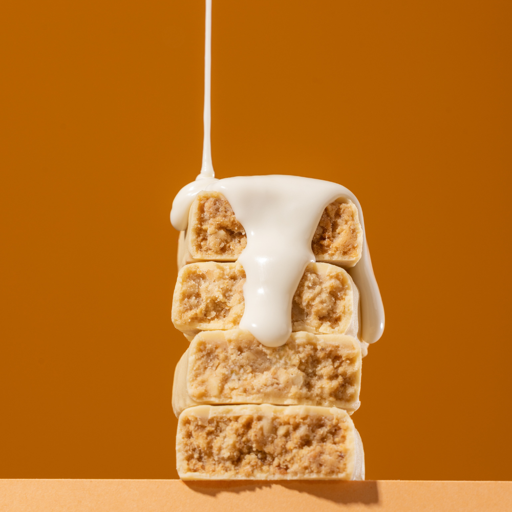 PAÇOCA COM WHEY COBERTA COM CHOCOLATE BRANCO - 27g